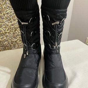 Women wide calf boots black size 9w. Lace up with side zipper. New with Tags